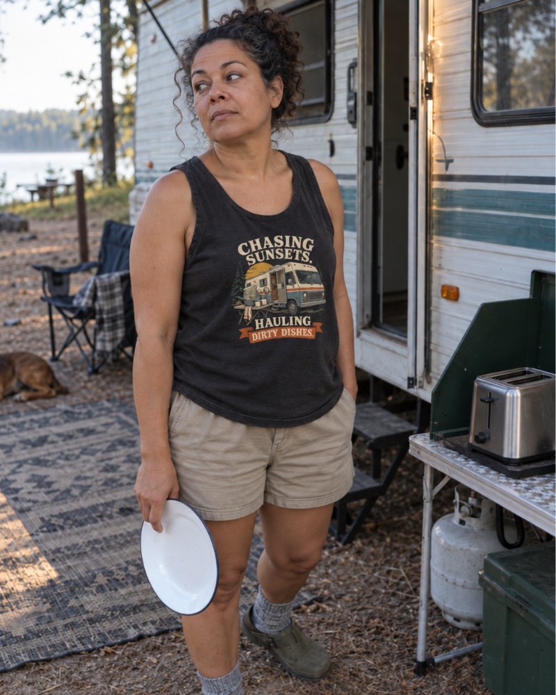 Camper and dog at a tent, both in Questionable Outdoors gear